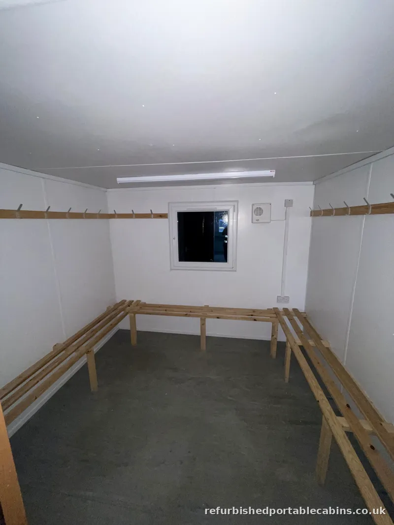 Drying Rooms Bench seating and hook rails fitted in a refurbished portable cabin drying room