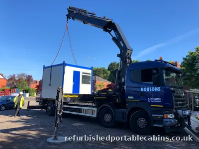9ft portable cabin delivered and positioned by HIAB