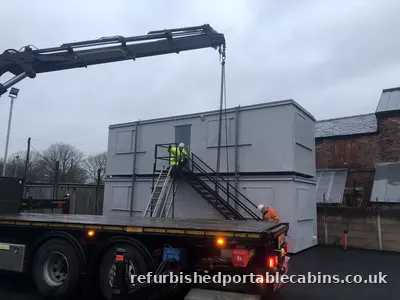 Refurbished cabins delivered and set up by our own HIAB
