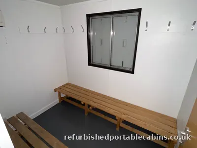 Bench seating and hooks in a refurbished drying room