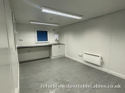 Refurbished canteen cabin with a fitted kitchen area