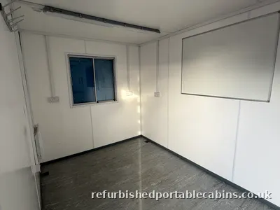 Open plan cabin interior used as a meeting room