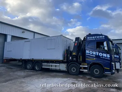 Refurbished portable cabins loaded and ready for delivery